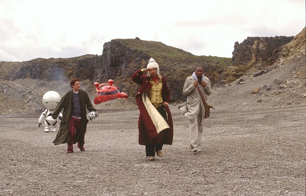 Pictured: The Heart of Gold's excursion pod has landed (rather badly) on a desolate alien planet, and Marvin, Arthur (MARTIN FREEMAN), Zaphod (SAM ROCKWELL), and Ford (MOS DEF), must continue on foot in a scene from the hilarious comedy, "The Hitchhiker's Guide to the Galaxy," directed by Garth Jennings and produced by Nick Goldsmith.

FOR PRINT OUTLETS ONLY. NOT FOR INTERNET USE. Distributed by Buena Vista International. Permission is hereby granted to magazines and newspapers to reproduce this picture on condition that it is accompanied by ©DISNEY ENTERPRISES, INC. & SPYGLASS ENTERTAINMENT, LLC.   ALL RIGHTS RESERVED. FOR PRINT OUTLETS ONLY. NOT FOR INTERNET USE.