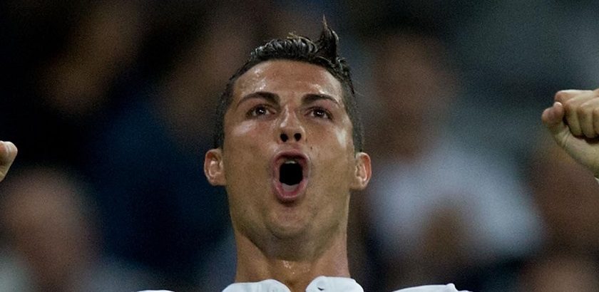 MADRID, SPAIN - SEPTEMBER 23:  Cristiano Ronaldo of Real Madrid CF celebrates scoring their fifth goal during the La Liga match between Real Madrid CF and Elche CF at Estadio Santiago Bernabeu on September 23, 2014 in Madrid, Spain.  (Photo by Gonzalo Arroyo Moreno/Getty Images)