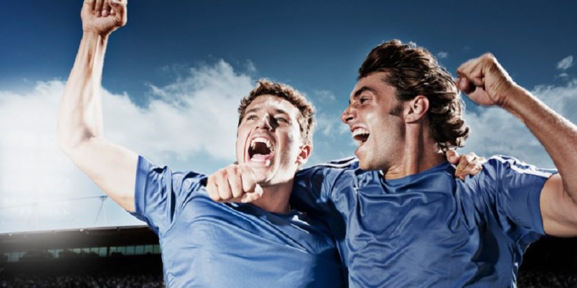 Soccer players cheering